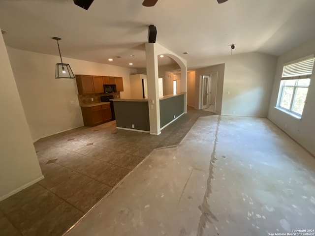 kitchen featuring ceiling fan and pendant lighting