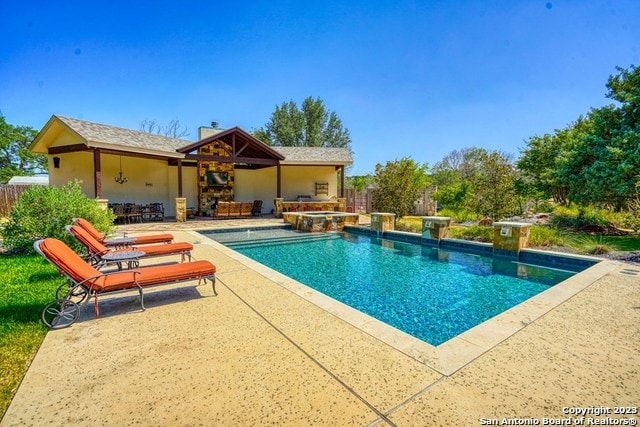 view of swimming pool with a patio area