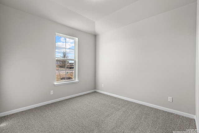 spare room featuring carpet