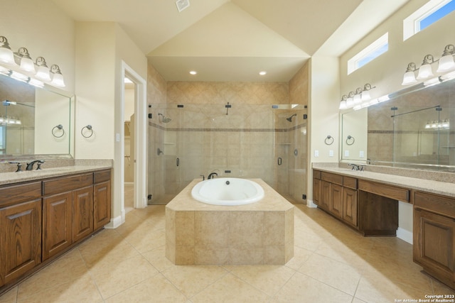 bathroom with tile flooring, plus walk in shower, and vanity