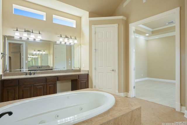 bathroom with tile floors, vanity with extensive cabinet space, and ornamental molding