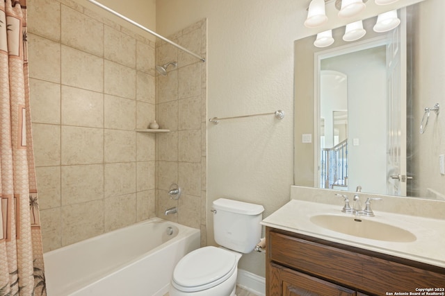 full bathroom featuring toilet, shower / bathtub combination with curtain, and oversized vanity