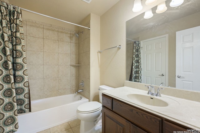 full bathroom featuring tile floors, oversized vanity, toilet, and shower / bathtub combination with curtain