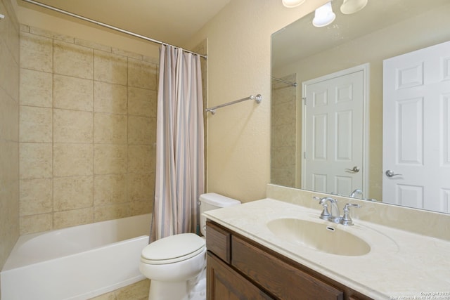 full bathroom featuring shower / tub combo, toilet, and vanity