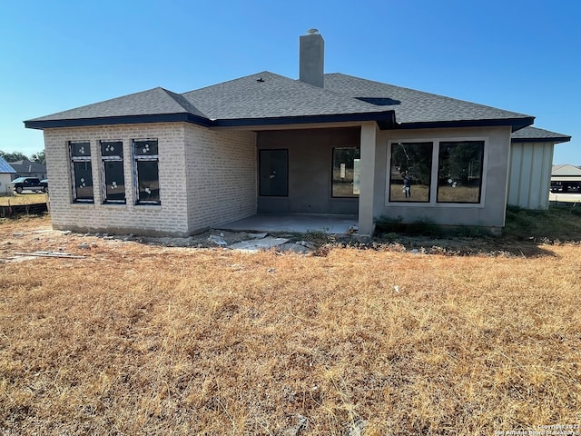 back of house featuring a patio