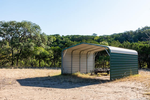 view of shed / structure featuring a carport