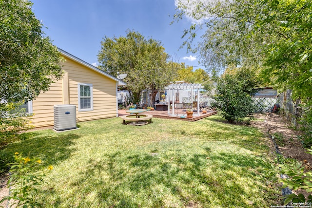 view of yard featuring an outdoor fire pit