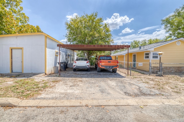 view of parking featuring a carport