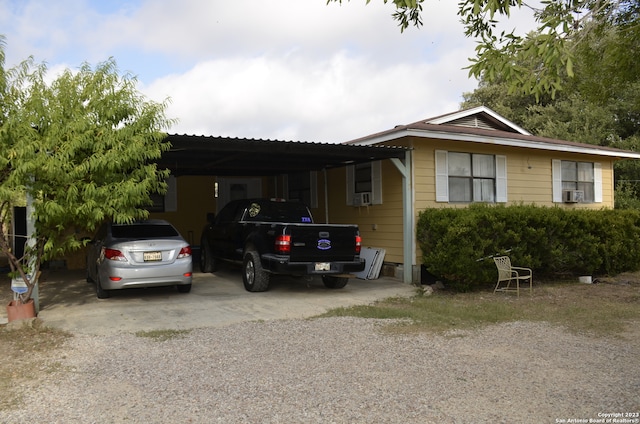 view of front of house with a carport