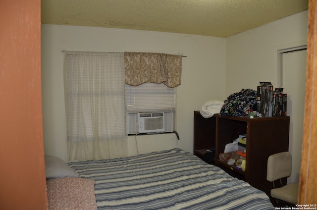 bedroom with a textured ceiling