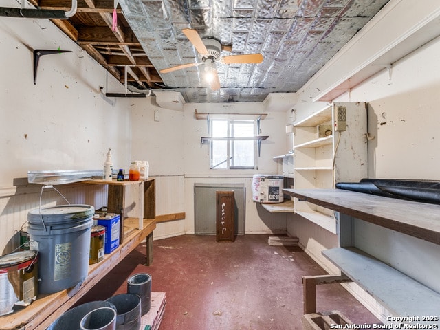 basement with ceiling fan