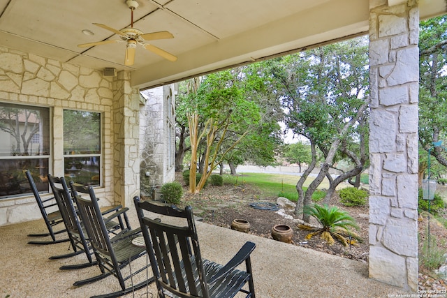 view of patio featuring ceiling fan