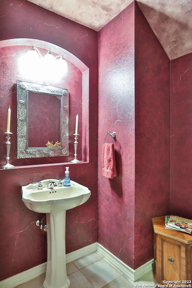 bathroom featuring tile flooring