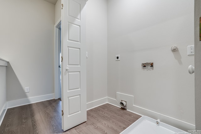 laundry room with washer hookup, electric dryer hookup, gas dryer hookup, and hardwood / wood-style flooring