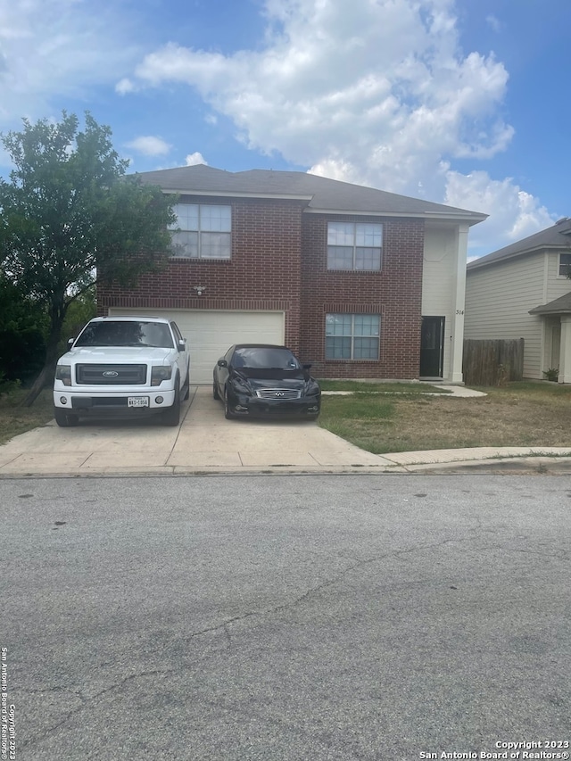 view of front of property featuring a garage