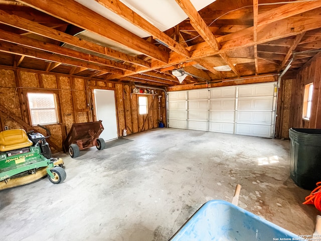 garage featuring a garage door opener