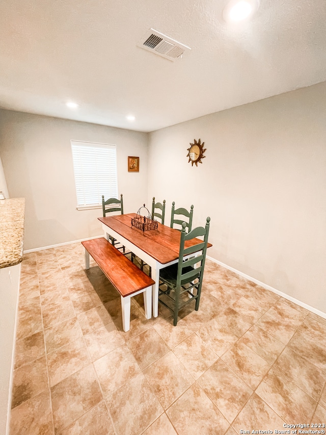 view of tiled dining area