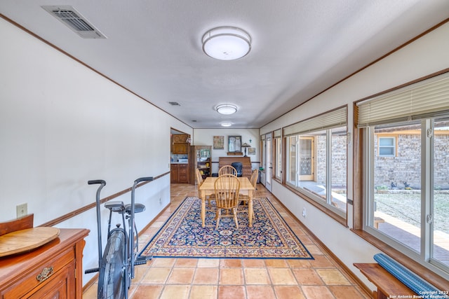 dining area with light tile floors