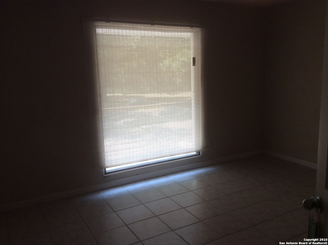 view of tiled empty room