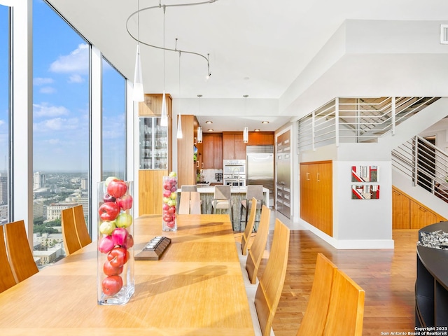 dining room featuring hardwood / wood-style floors and a wealth of natural light