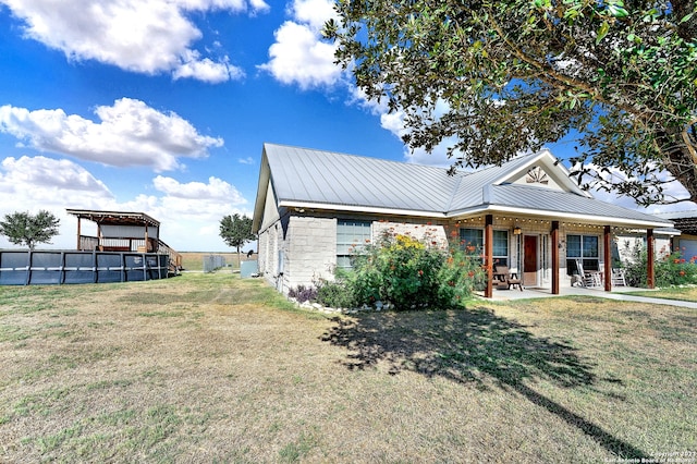 view of property exterior with a yard