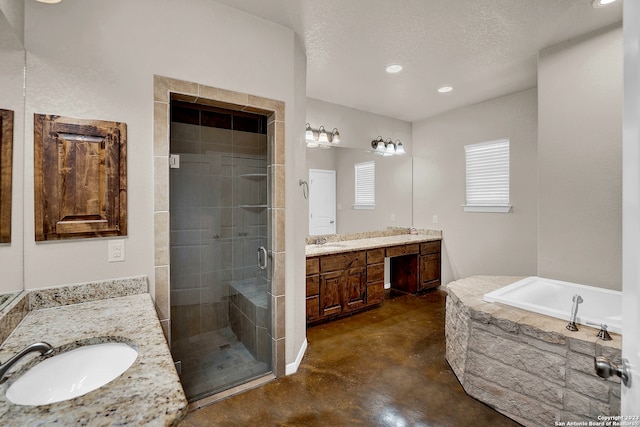 bathroom featuring concrete floors, a textured ceiling, independent shower and bath, and dual bowl vanity