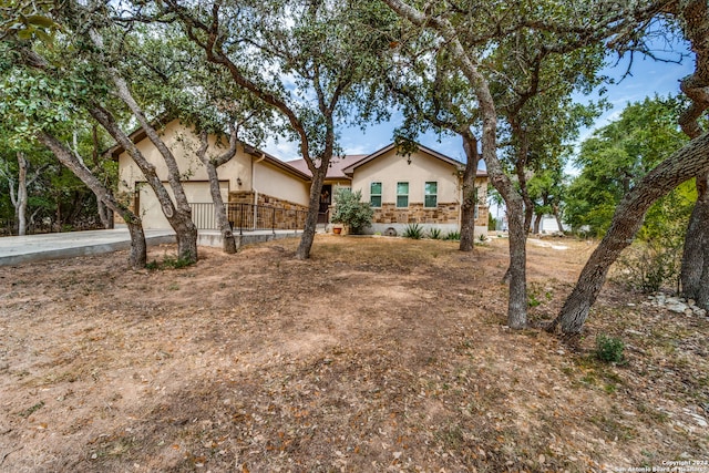 single story home with a garage