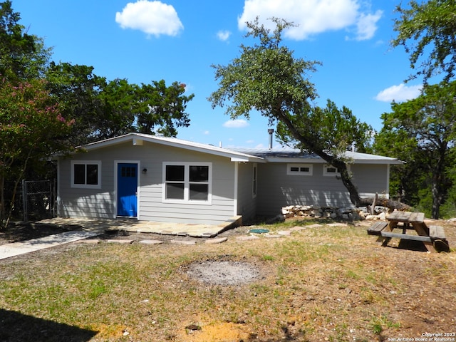 back of property with fence