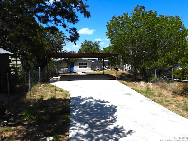 view of front of home with a carport