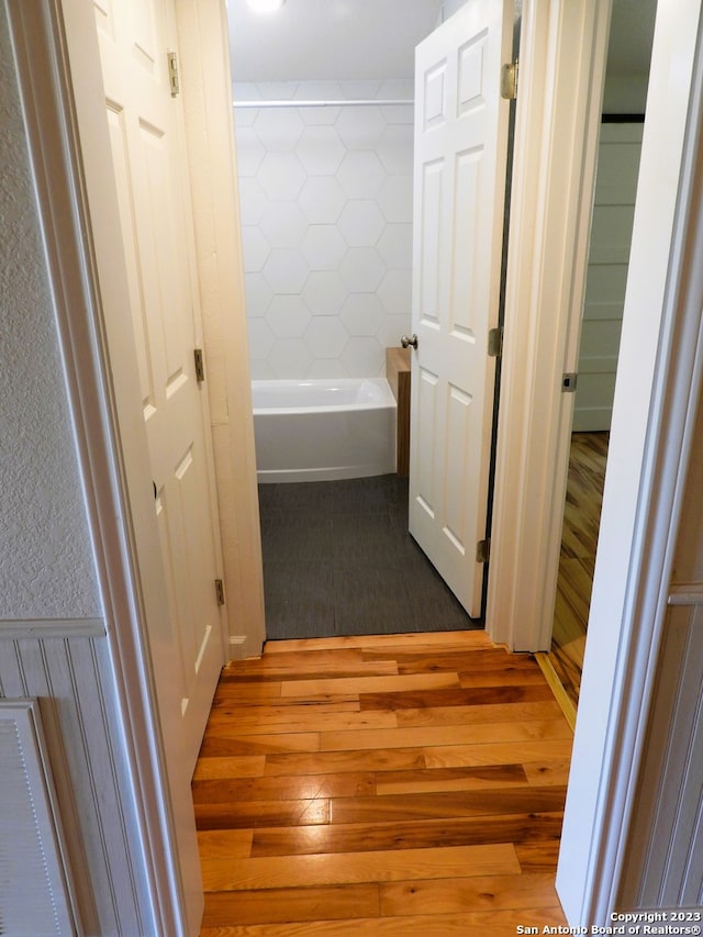 hallway featuring hardwood / wood-style floors