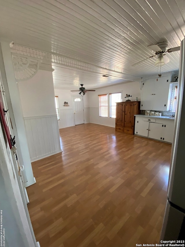 interior space featuring ceiling fan and light hardwood / wood-style floors