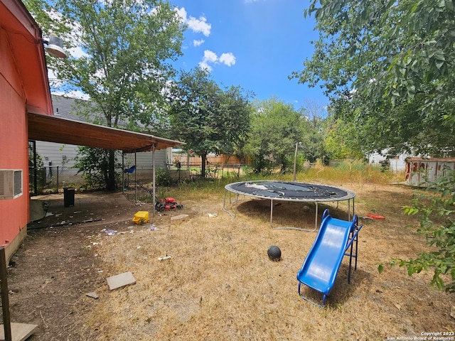 view of yard featuring a trampoline