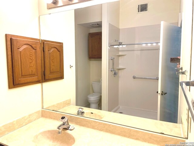 bathroom featuring sink and toilet