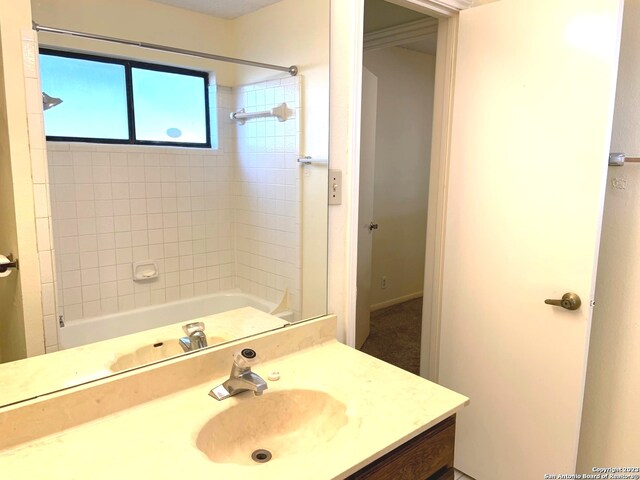 bathroom featuring shower / bathtub combination and vanity