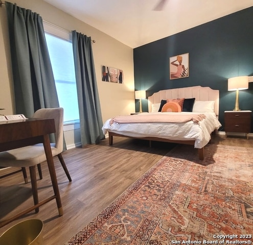 bedroom featuring dark hardwood / wood-style floors