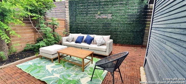 view of patio with an outdoor living space