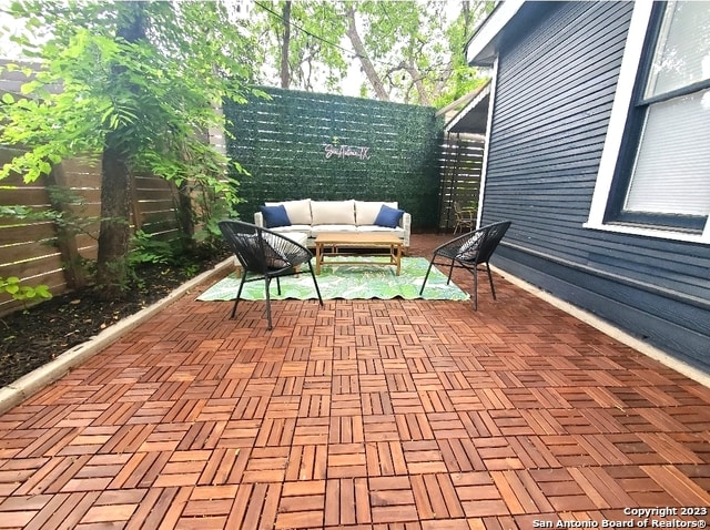 view of terrace with an outdoor living space