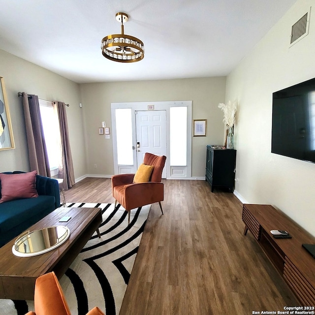 living room featuring dark hardwood / wood-style floors