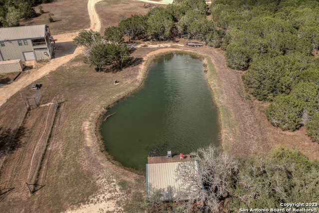 birds eye view of property featuring a water view