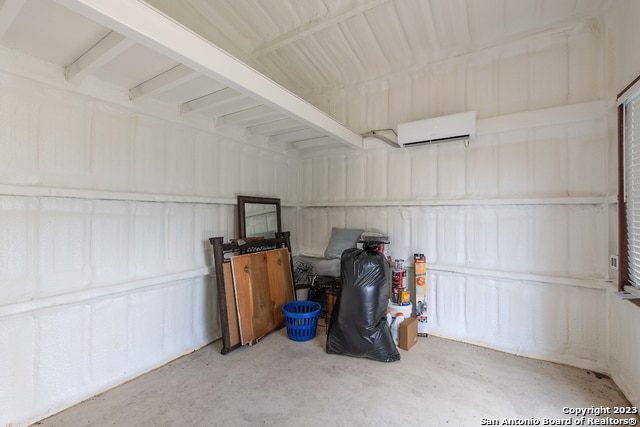 garage with a wall unit AC