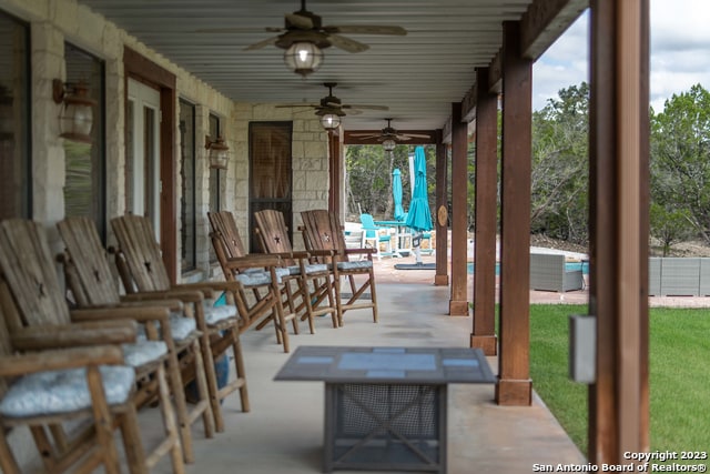 view of patio with ceiling fan