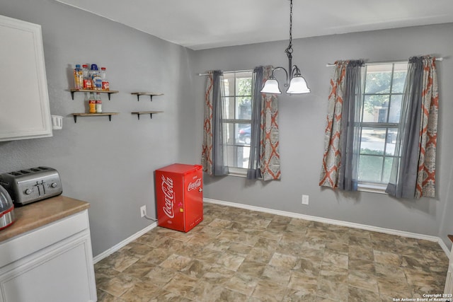 dining room featuring a chandelier