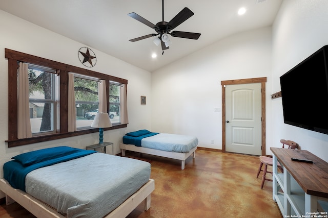 bedroom featuring ceiling fan and vaulted ceiling