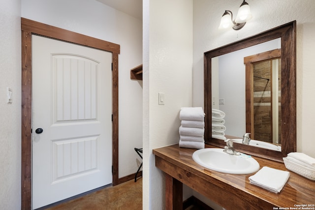 bathroom featuring oversized vanity