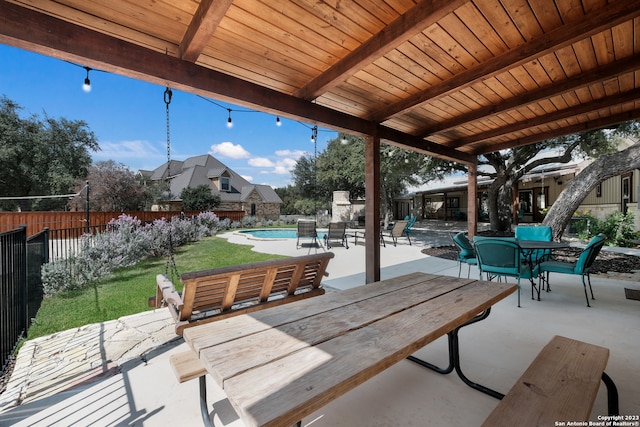 view of terrace featuring a fenced in pool