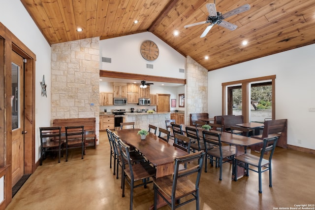 dining room featuring ceiling fan, beamed ceiling, high vaulted ceiling, concrete flooring, and wood ceiling