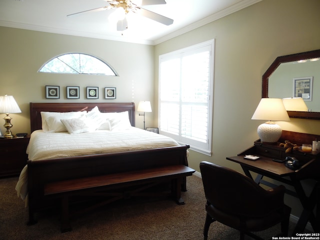 carpeted bedroom featuring ornamental molding and ceiling fan