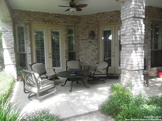 view of patio with ceiling fan