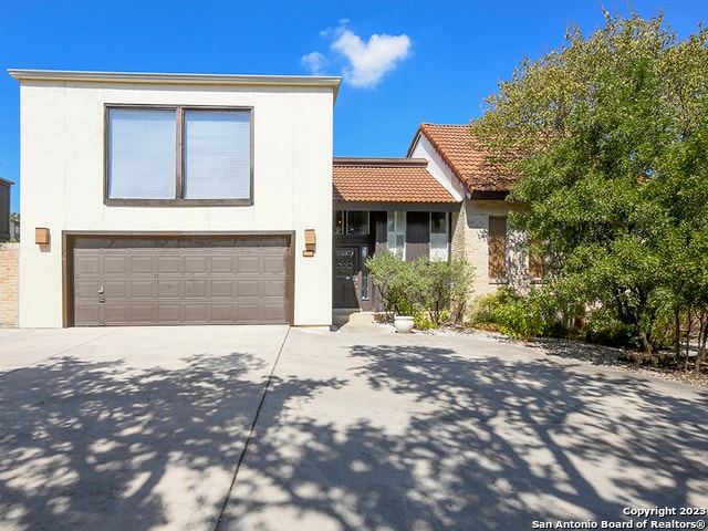 view of front of property with a garage