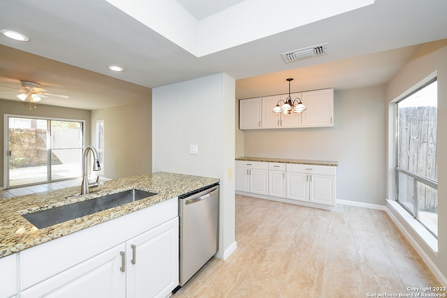 kitchen with white cabinets, sink, dishwasher, and ceiling fan with notable chandelier